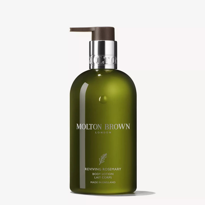 A green 300ml bottle of MOLTON BROWN Reviving Rosemary Body Lotion features a pump dispenser and silver collar, offering moisturised skin and aromatherapy benefits, with white label text, displayed on a plain white background.