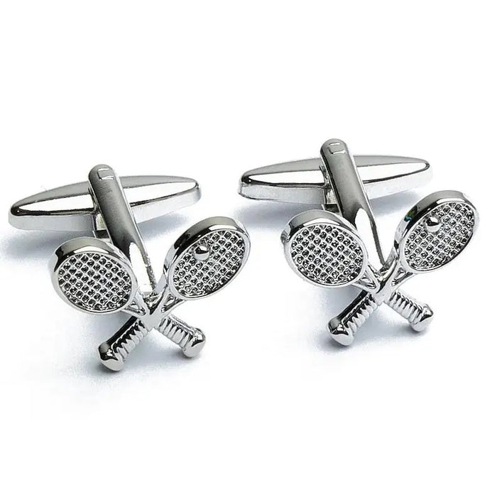 STOLEN RICHES - TENNIS RAQUET CUFFLINKS by STOLEN RICHES feature detailed, crossed silver rackets—an ideal gift for tennis fans and a stylish men’s accessory, perfect for any collection.