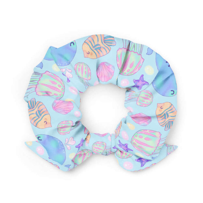 Under the Sea kawaii scrunchie in blue with peach-striped tropical fish and golden bubbles
