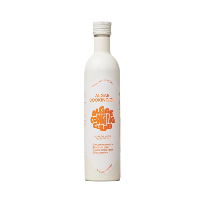 A white 16 fl oz bottle of ALGAE COOKING CLUB - ALGAE COOKING OIL is displayed, featuring orange text and graphics, including the stylized “Algae Cooking Club” branding. Designed for high-heat cooking and heart health, the bottle has a white cap and is set against a plain white background.