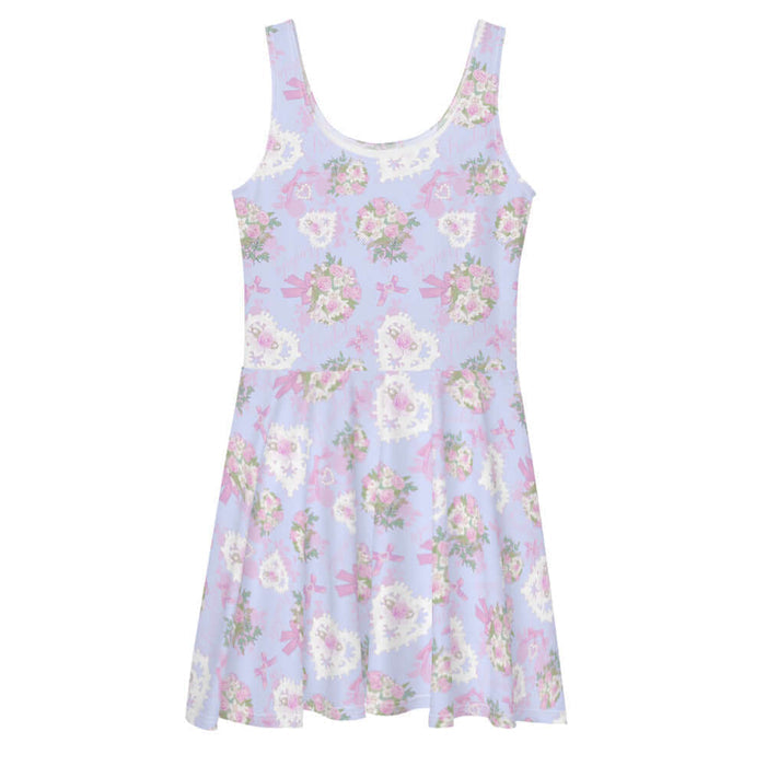 Anniversary kawaii skater dress in blush and periwinkle with strands of pearls and baby's breath