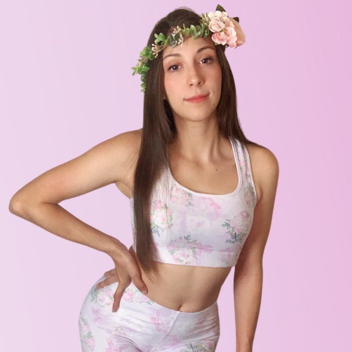 Anniversary kawaii sports bra in blush and periwinkle with strands of pearls and baby's breath