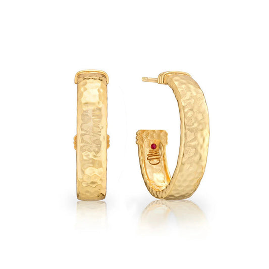 The CAPUCINE DE WULF Cleopatra Classic Medium Hoop Earrings feature a hammered gold finish, textured surface, and a subtle red dot on the inner edge. Shown from front and side views. Anti-tarnish coating ensures lasting shine.