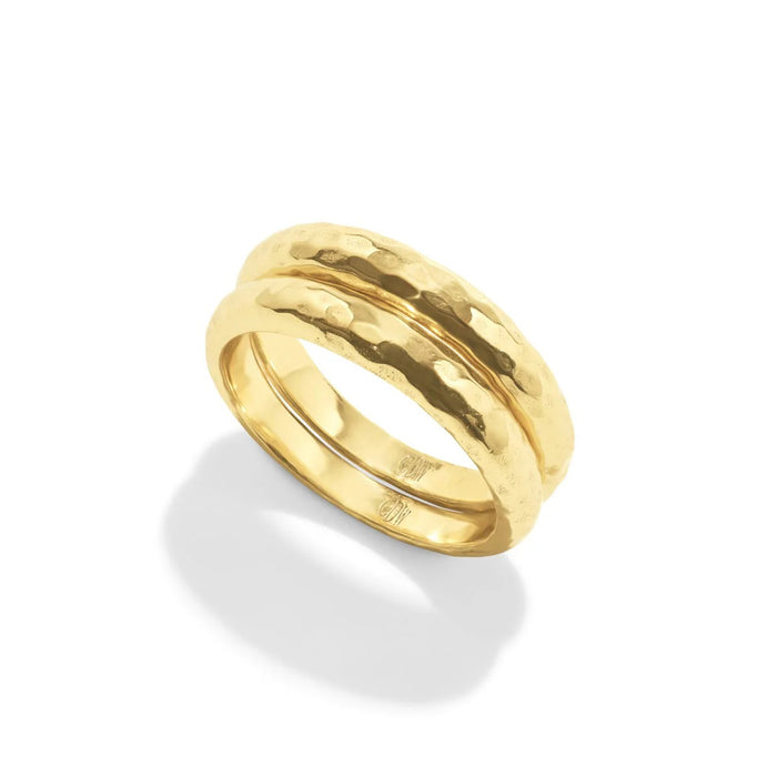 The CAPUCINE DE WULF - CLEOPATRA SLICE STACKING RING SET features a hammered gold double-band design, perfect for stacking. This handmade piece from CAPUCINE DE WULF is shown on a white background.