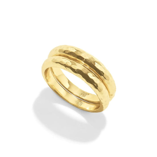 The CAPUCINE DE WULF - CLEOPATRA SLICE STACKING RING SET features a hammered gold double-band design, perfect for stacking. This handmade piece from CAPUCINE DE WULF is shown on a white background.