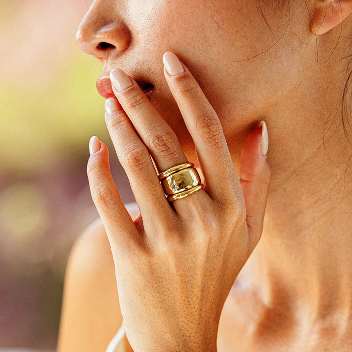 CAPUCINE DE WULF - Cleopatra Slice Stacking Set Rings, Size 9: Two hammered-texture 18K gold rings by CAPUCINE DE WULF, shown stacked against a plain white background.