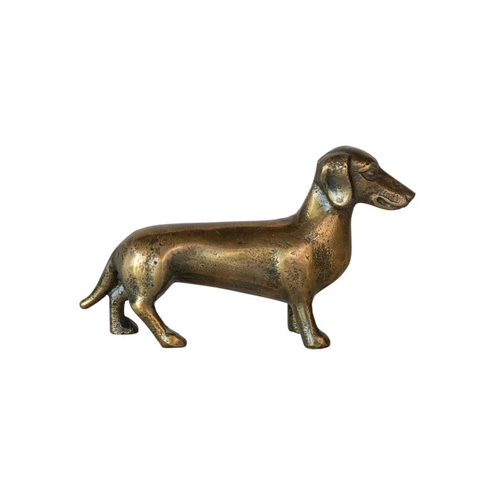 The CREATIVE COOP CAST ALUMINUM DACHSHUND stands on all four legs in profile against a white background—ideal as charming dachshund accent decor.
