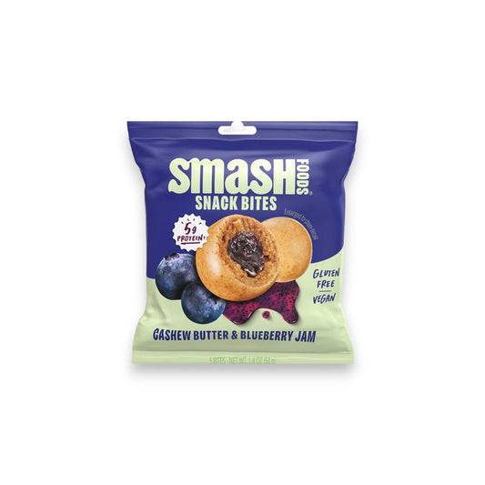 The image shows the back of a CHIA SMASH pack, with nutrition facts on the left and product details on the right. It highlights simple ingredients, gluten-free and vegan benefits, featuring protein-rich CASHEW BUTTER AND BLUEBERRY SNACK BITES and includes Nut Butter + Jam for added flavor at the bottom.
