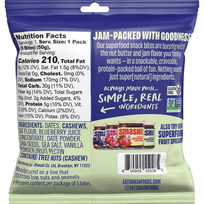 A bag of CHIA SMASH - CASHEW BUTTER AND BLUEBERRY SNACK BITES displays a blueberry filling, fresh blueberries, and emphasizes that it is gluten-free, vegan, with 5g of protein.