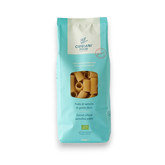 A box of Cipriani Organic Rigatoni pasta from Atalanta Corporation, made from durum wheat semolina. The packaging is light green with blue accents and features a small window showing the pasta inside. A nod to Italian culinary heritage, the box contains 250 grams of the product and has the Italian flag on the upper right corner.