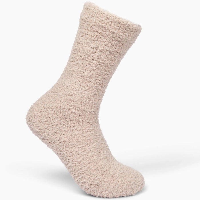 Beige fuzzy socks made from soft plush material are wrapped in a white "Cozy Cloud Socks" label displaying "Giften Market" and "GIFTENMARKET.COM." These women's socks are neatly folded and viewed from above on a plain background.