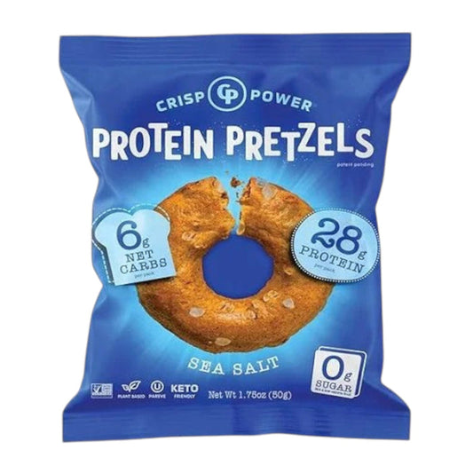 A blue bag of CRISP POWER - PROTEIN PRETZEL SEA SALT by CRISP POWER features a pretzel ring image and highlights 6g net carbs, 28g protein, 0g sugar, and keto-friendly attributes—making these plant-based protein pretzels an ideal choice for healthy snacking anytime.