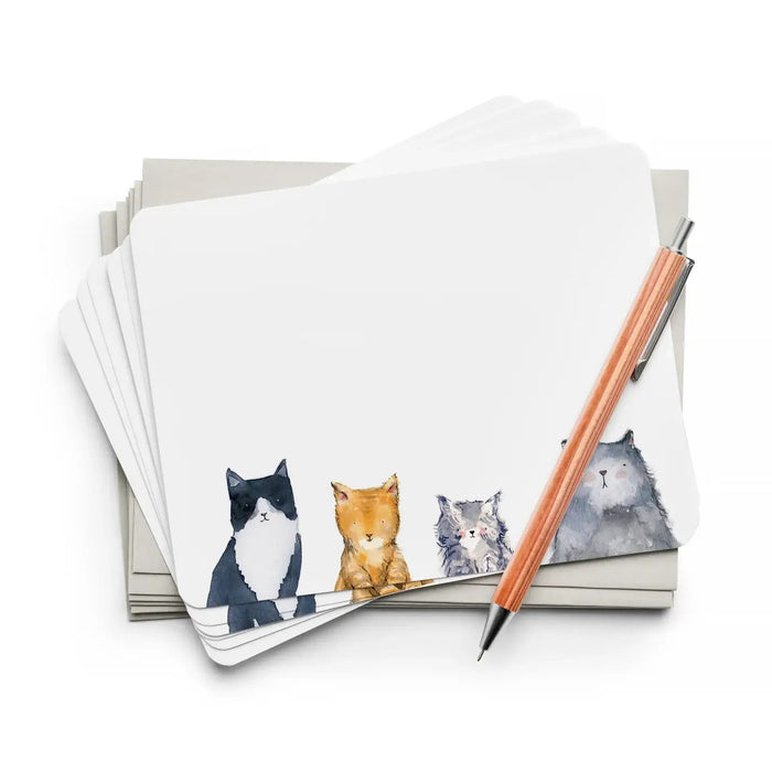The E. FRANCES PAPER - FLAT NOTES CAT'S MEOW set includes flat notecards with watercolor illustrations of four different cats and matching envelopes, all in light green packaging with a transparent window.