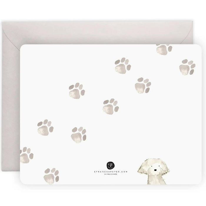 E. FRANCES PAPER - FLAT NOTES DOG DAYS includes 8 notecards and envelopes, each featuring illustrations of four distinct dog breeds with vibrant colors. The set is packaged in a light green box with a transparent lid, highlighting the charming contents.