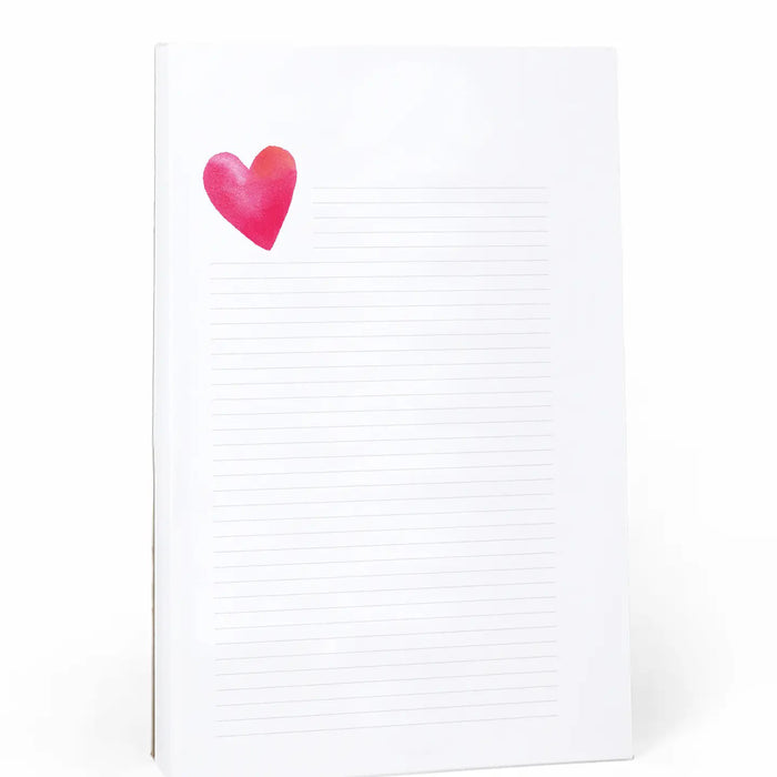 The E. Frances Paper Heart Lined Notepad boasts a charming pink and red heart illustration in the top left corner, reflecting the brand's commitment to quality products that blend style with functionality.