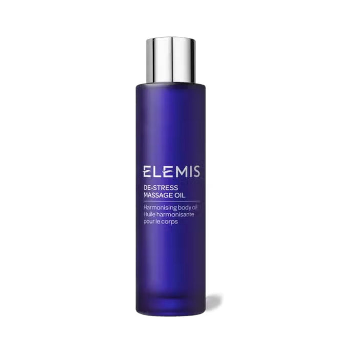 A blue bottle of ELEMIS - DE-STRESS MASSAGE OIL by ELEMIS - STEINER features a silver cap and white text. Labeled as harmonizing body oil infused with essential oils, it sits against a plain white backdrop. Perfect for aromatherapy and relaxation.