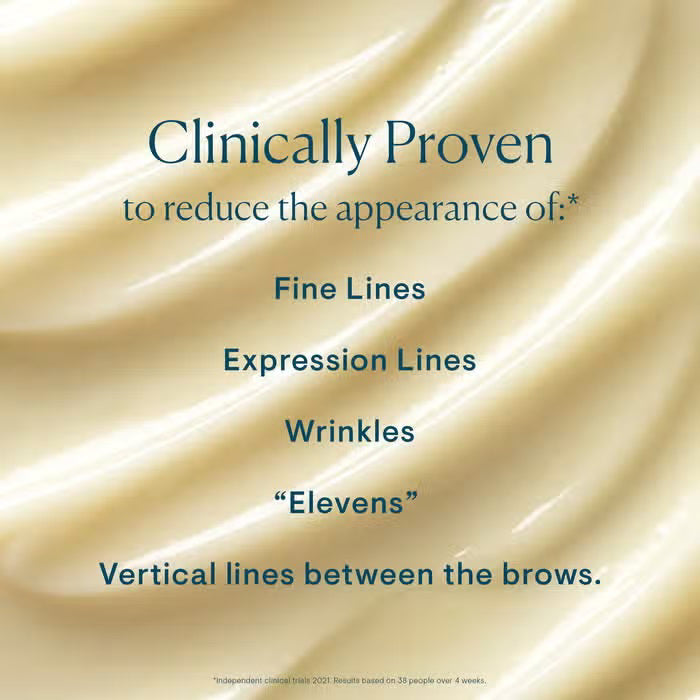 A turquoise jar of ELEMIS - PRO-COLLAGEN MORNING MATRIX cream displays its off-white texture. This "Performance day cream" by ELEMIS - STEINER combats expression lines and boosts collagen amidst a crisp white background.