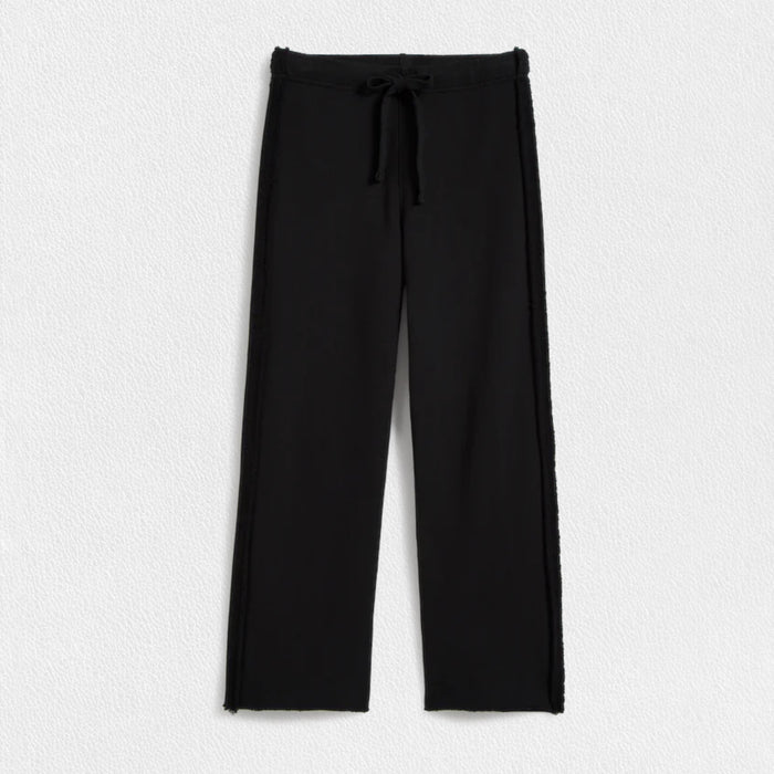The FRANK & EILEEN BELLA Italian Sweatpant in black features a drawstring waist, side seam detail, and a lightly frayed hem, shown flat on a light textured background.