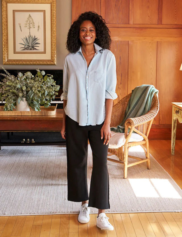 The FRANK & EILEEN BELLA Italian Sweatpant in black features a drawstring waist, side seam detail, and a lightly frayed hem, shown flat on a light textured background.