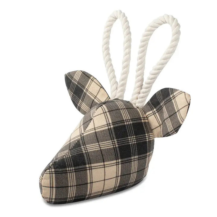 The PET SHOP BY FRINGE STUDIO - PLAID DEER DOG TOY is a durable cotton canvas pet toy shaped like a deer’s head in black and beige plaid, featuring large soft ears and rope antlers for safe, playful fun.
