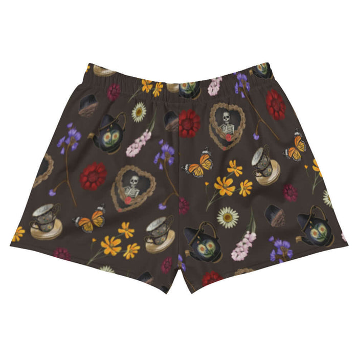 Gothic Tea Time athletic short shorts in black with a heart-wreathed skeleton and golden cosmos, pastel goth fashion