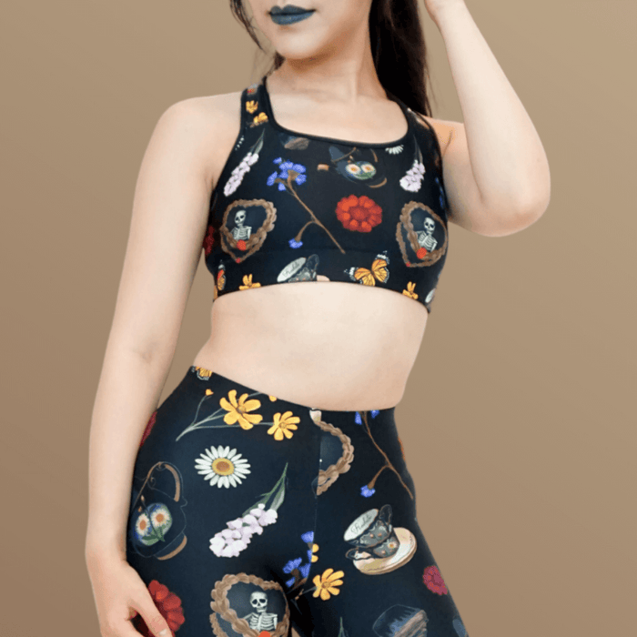 Gothic Tea Time sports bra in black with stacked vintage teacups and monarch butterflies, alternative style