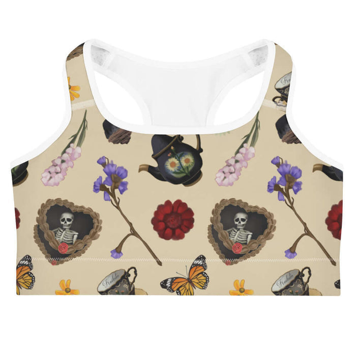 Gothic Tea Time sports bra in black with a rose-clutching skeleton and white daisies, alternative style