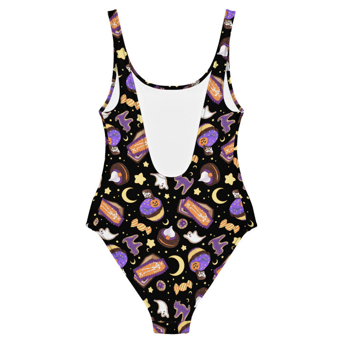 Halloween Treat alternative one-piece swimsuit in black with crescent moons and coffin cakes