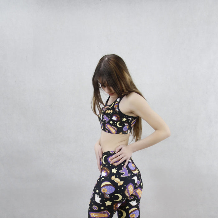 Halloween Treat alternative sports bra in black with marshmallow ghosts and witch hats