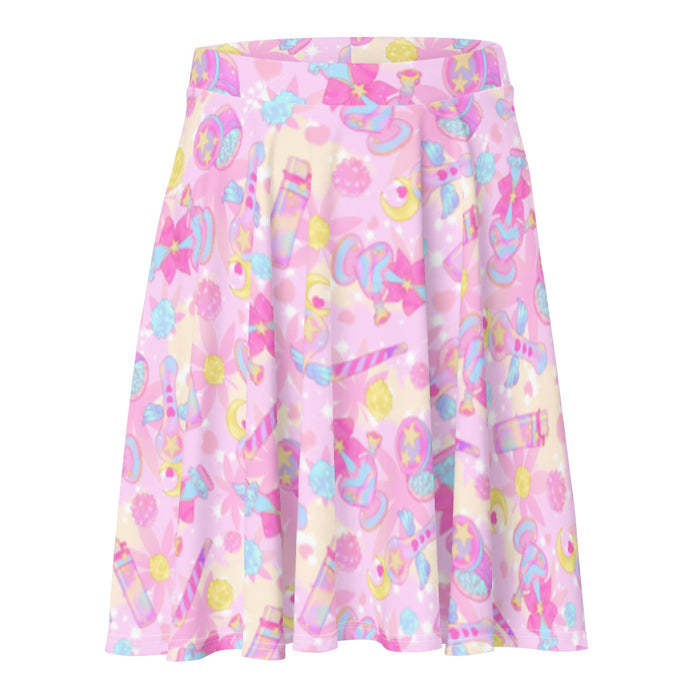 Indica Magica kawaii skater skirt in pink with winged star-tipped pipes and gold stars