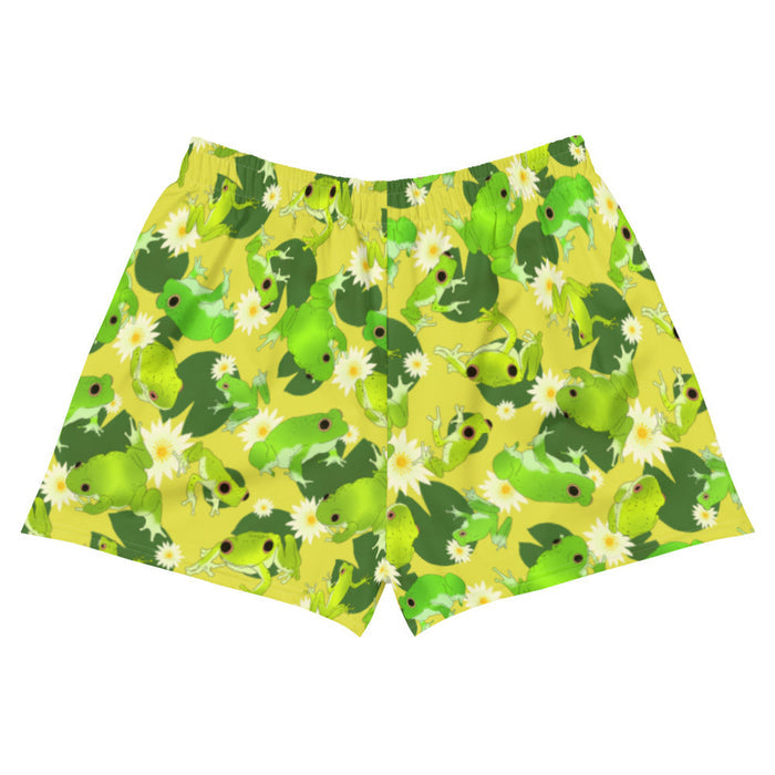 Kero-kero kawaii athletic shorts in green with webbed-toed frogs and white lotus blossoms