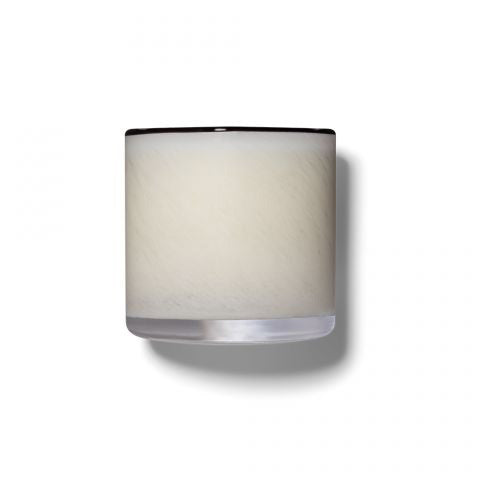 The LAFCO Champagne Penthouse 6.5oz candle, set in a clear glass holder on a white background, evokes calm and sophistication—like savoring fresh notes of orange in an elegant penthouse setting.