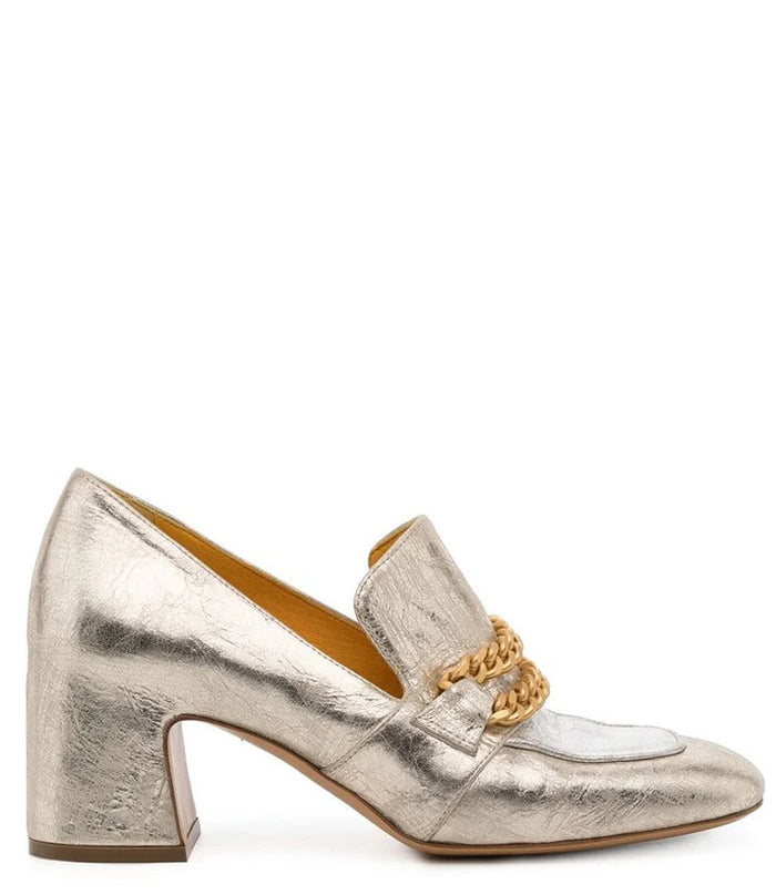 The LEATHER MID HEEL LOAFER WITH CHAIN by MADISON MAISON is a metallic silver loafer with a gold chain across the square toe, sturdy mid heel, and showcases exquisite Italian craftsmanship.
