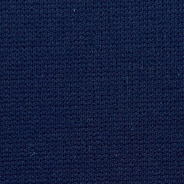 Close-up of the MEIMEIJ - PULL ON LEGGING PANT by MEIMEIJ, featuring a dark blue, tightly woven fabric with a slightly textured surface and uniform finish—ideal for ankle-length stretch leggings.