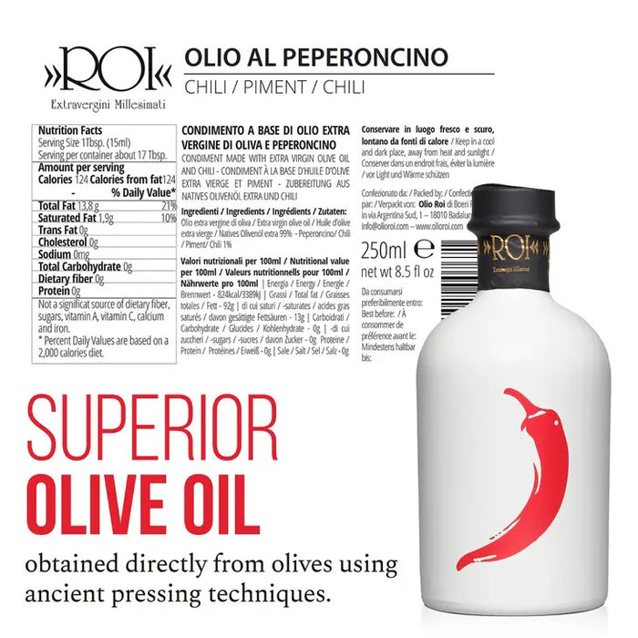 A white bottle with a black cap displays a bold red chili pepper illustration, gold and black decorative text on the neck, and contains MERCATO DI BELLINA - ITALIAN CHILI PEPPER INFUSED OLIVE OIL.