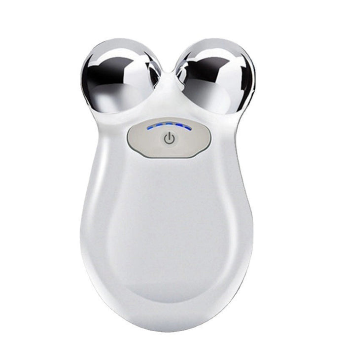 A white, handheld MICROCURRENT FACIAL TONING DEVICE by ETERUS features two metal spheres. Promoted benefits: wrinkle reduction, contour lifting, portability, and versatility. Design includes icons and green circles for a youthful look.