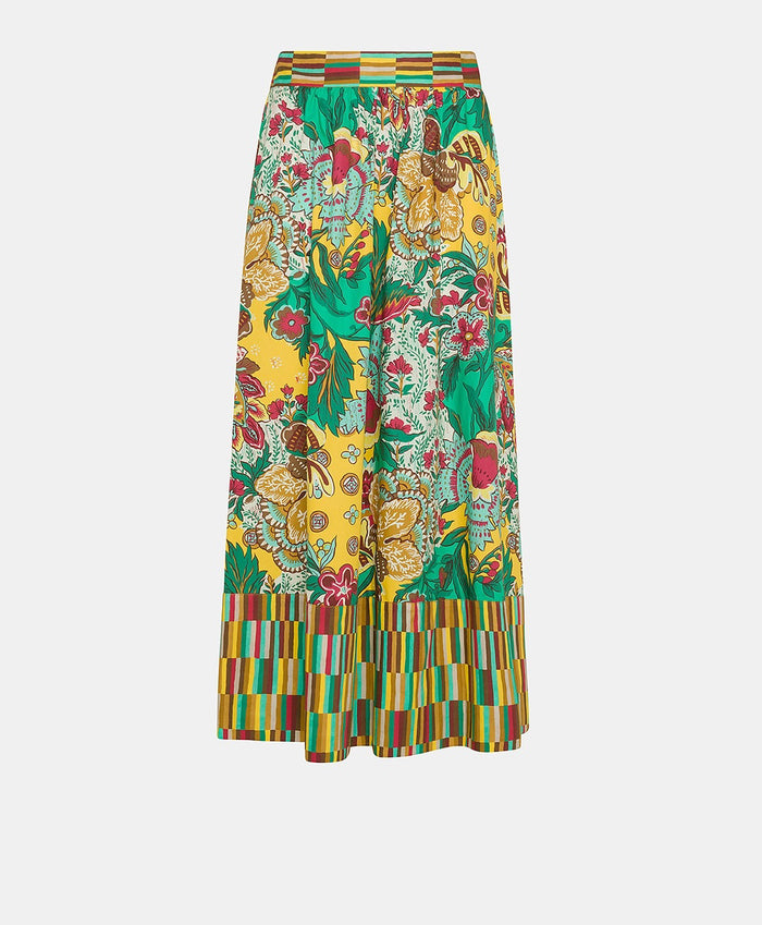 The MOMONI - IRIS SKIRT by MOMONI features vibrant yellow, green, and red floral prints on poplin with a geometric striped waistband and hem. Its flowy A-line silhouette offers effortless style.