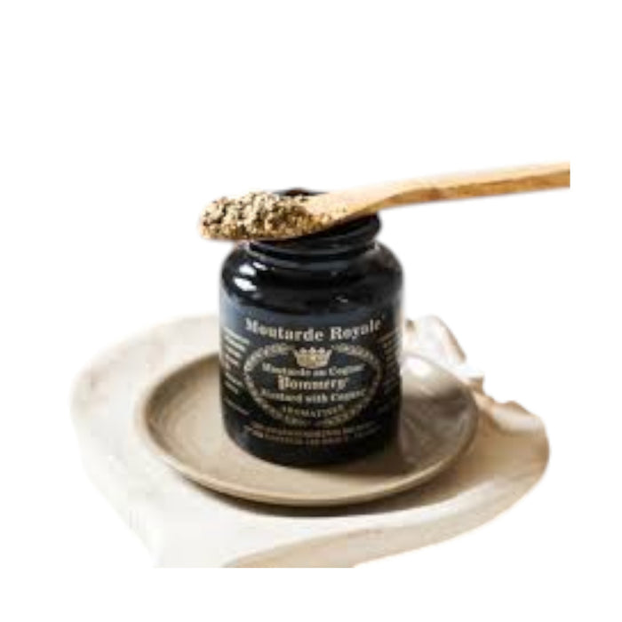 A black jar adorned with gold designs features the text “POMMERY FRENCH ROYAL MUSTARD WITH COGNAC.” Sealed with gold wax, the container showcases a crown and laurel graphic on the front. This elegant packaging holds authentic whole-grain mustard from Meaux by FRENCH FEAST.