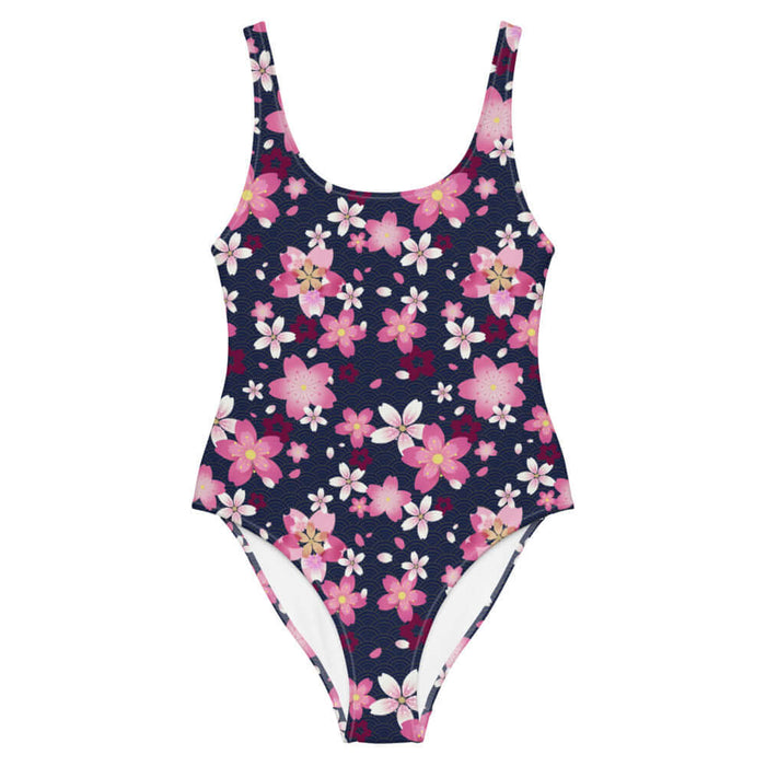 Sakura kawaii one-piece swimsuit in pink with drifting cherry blossom petals and golden wave arcs