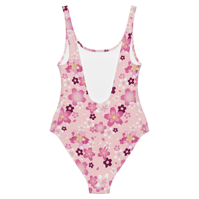 Sakura kawaii one-piece swimsuit in pink with golden-centered sakura and gold seigaiha waves