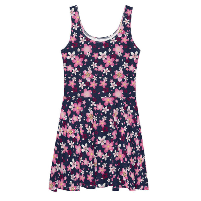 Sakura kawaii skater dress in pink with a single layered bloom and drifting petals