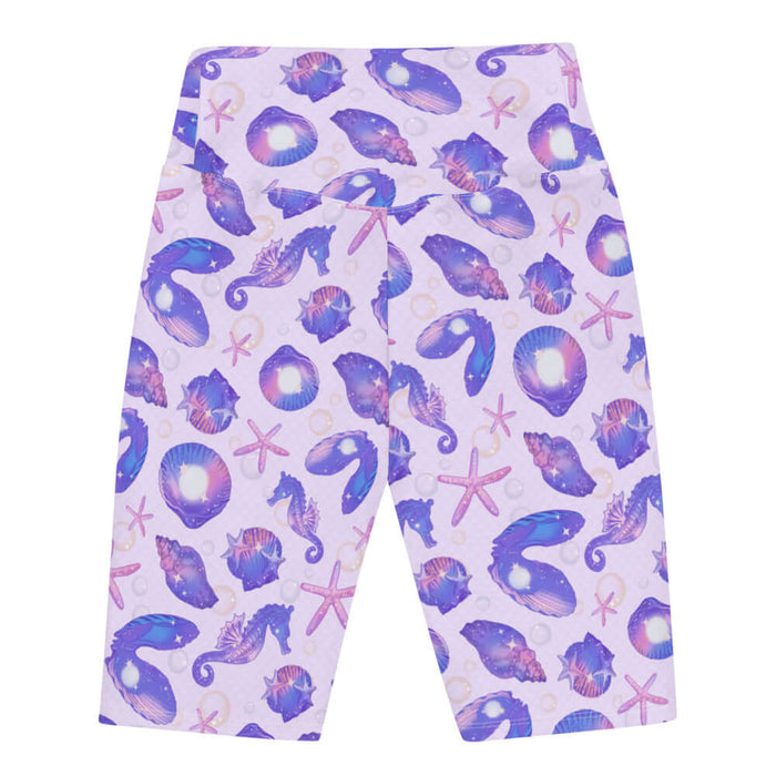 Sea Princess kawaii biker shorts with spiral shells and sea stars in pastel blue, pink and purple