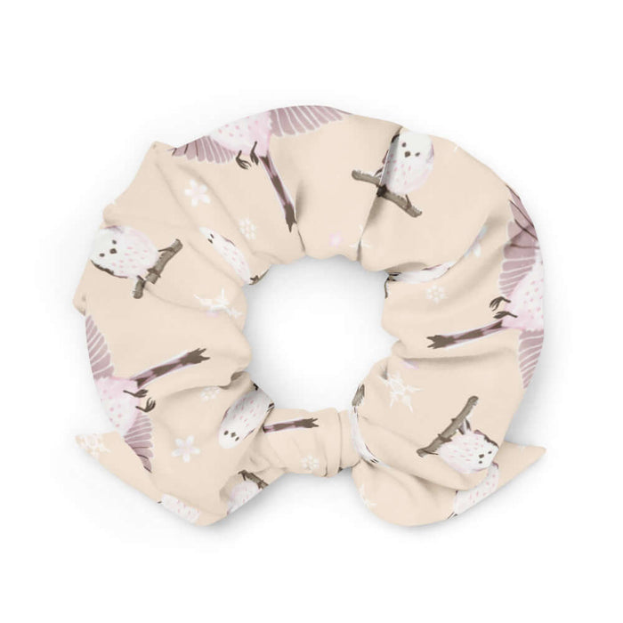 Snow Bird kawaii scrunchie in soft pastels with mid-flight birds and falling snow