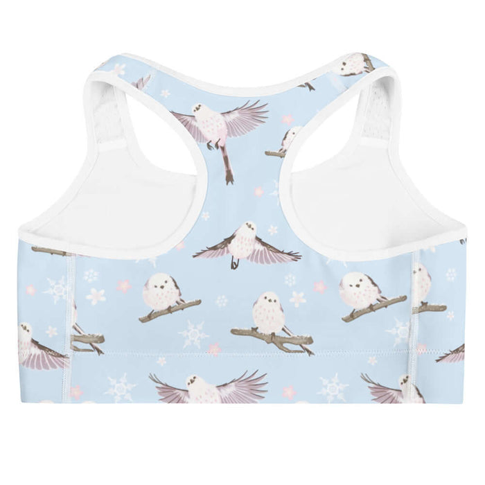 Snow Bird kawaii sports bra in soft pastels with blushing pink cheeks and cherry blossoms