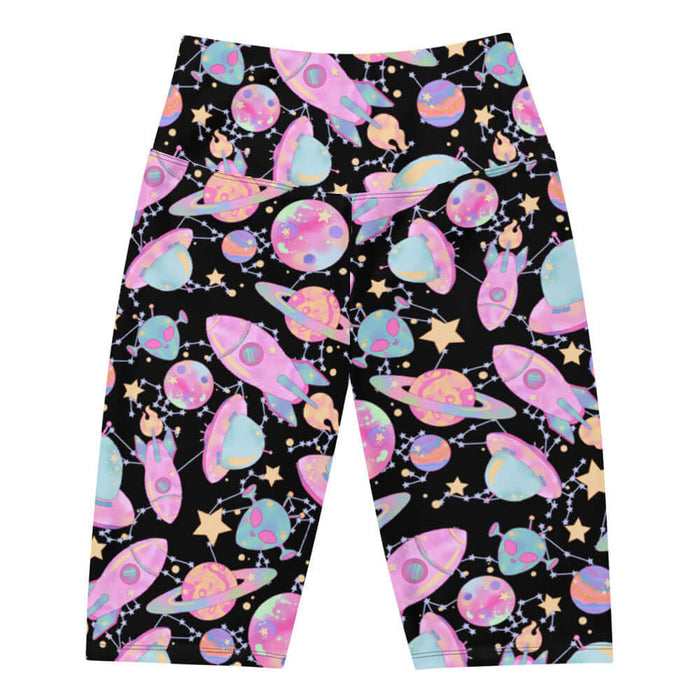 Space kawaii biker shorts in lavender with rainbow-swirled planets and glowing orbs