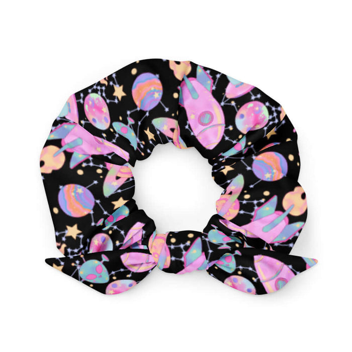 Space kawaii scrunchie in lavender with rainbow-swirled planets and glowing orbs