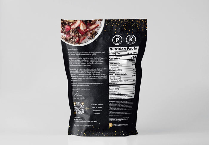 A black and gold pouch labeled "STRUESLI - CACO + COFFE GRANOLA" from STRUESLI showcases its grain-free, unsweetened, prebiotic, plant-based granola made in small batches, set against a plain background.