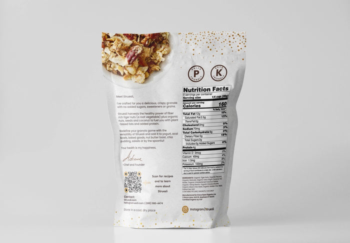 A white bag of STRUESLI - ORIGINAL ORGANIC GRANOLA stands upright, showing tiger nuts, pecans, and walnuts on the packaging. Features include plant-based protein, no sweeteners, grain-free recipe, and prebiotic benefits.