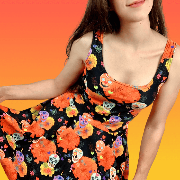 Sugar Skull kawaii skater dress with heart-eyed skulls and orange marigolds on black