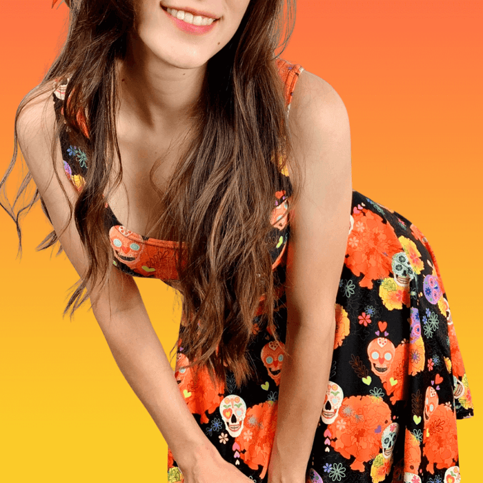 Sugar Skull kawaii skater dress with sugar skulls and scattered daisies on black